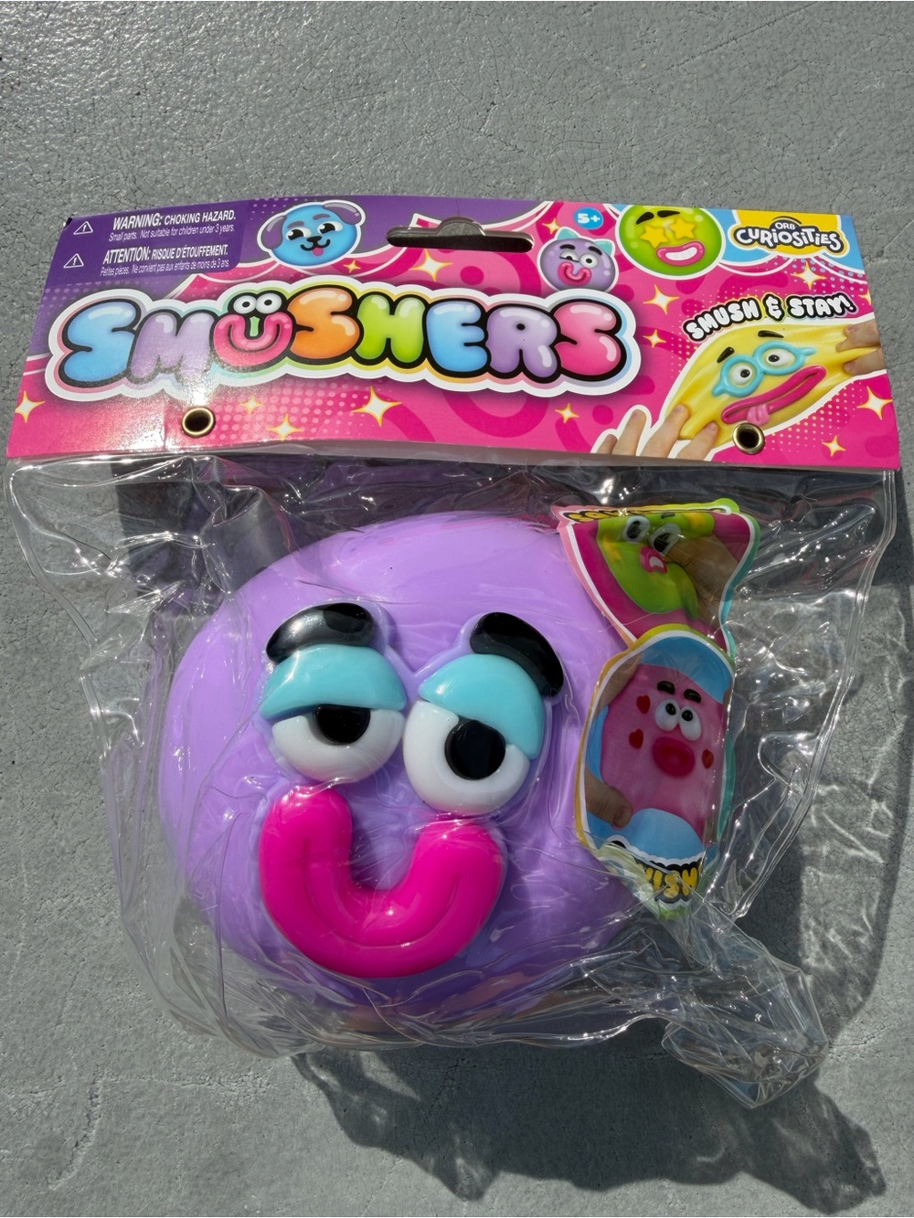 Authentic ORB Smushers Purple Squish Face Toy
